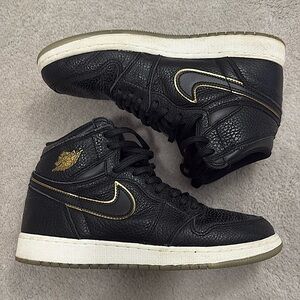 Nike Air Jordan High Tops - Black Leather with Gold Accents - Size 7Y